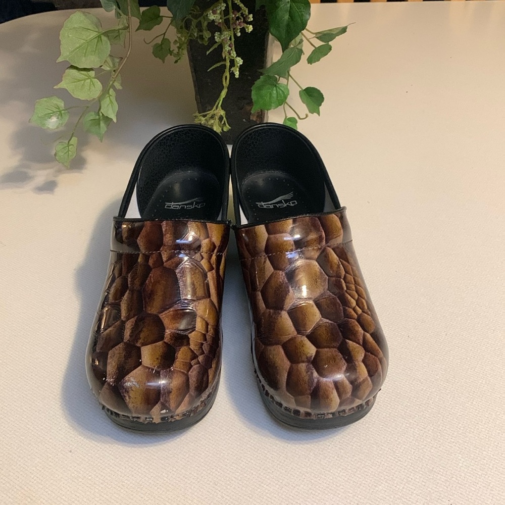 Dansco Women’s Leather Clogs with snakeskin design
